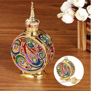 Vintage perfume bottles: egyptian style enameled metal and glass perfume bottle